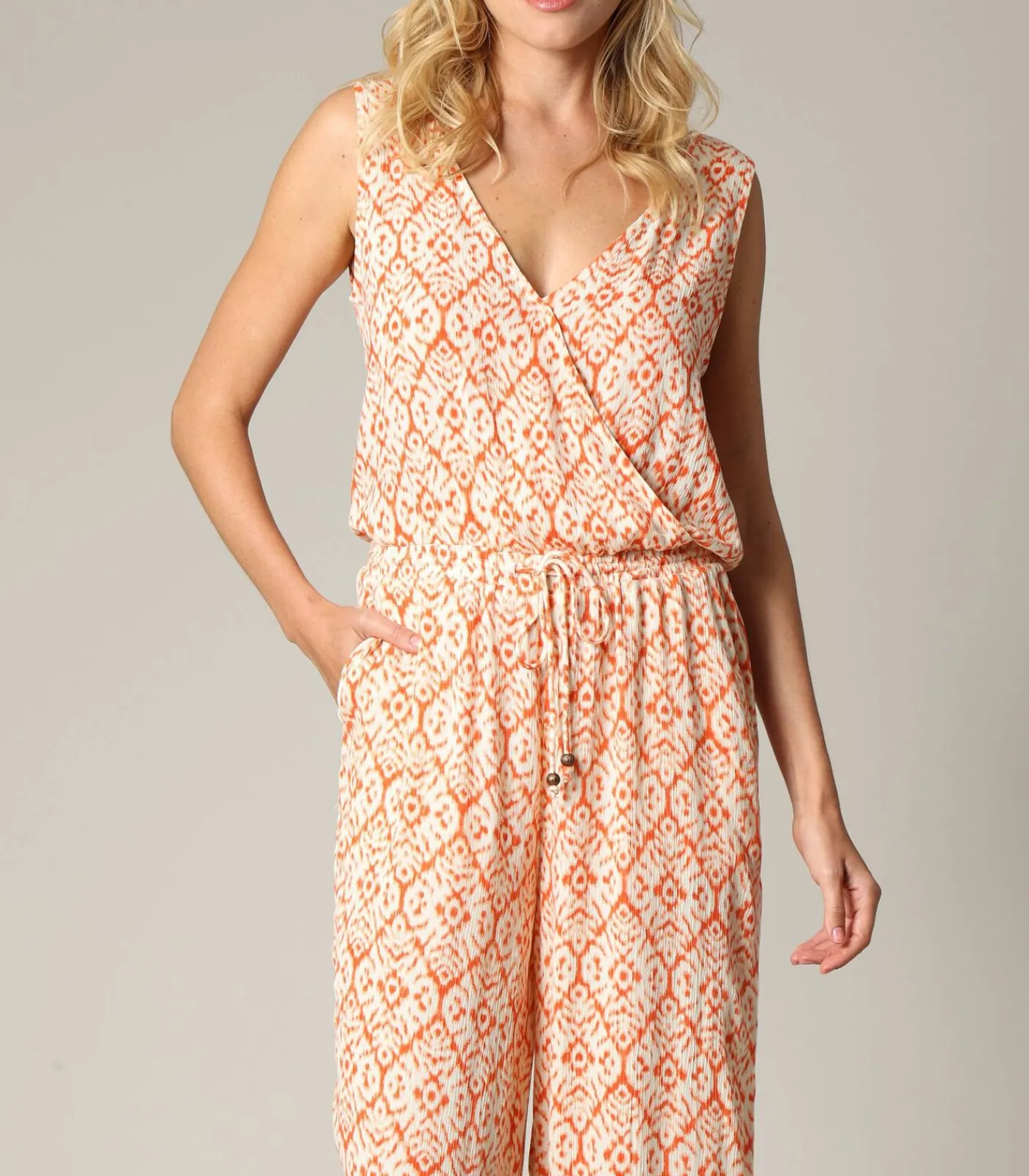 Deeluxe MIRZOU - Mouwloze Boheemse wikkeljumpsuit met etnisch patroon terracotta Outlet