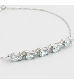 MES BIJOUX Witgouden armband met diamanten en topaas New