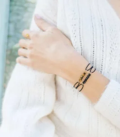 Maison Mutel Zwarte Spinel armband op 14k gold-filled gouden draad en rode koord